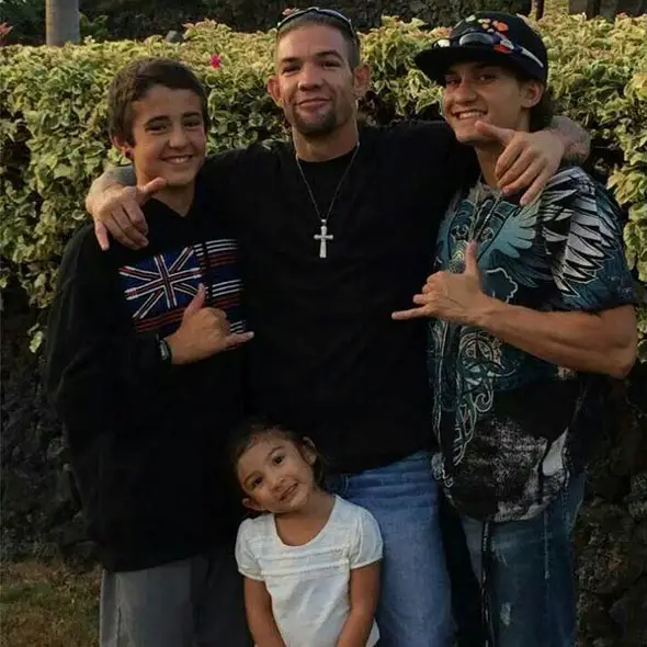 Leland Chapman with his children; two sons and a daughter